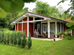 Single storey detached bungalow, in a wooded area